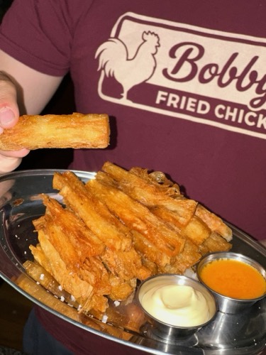 Thousand layer fries — paper thin potatoes pressed and laminated into crisp golden stacks