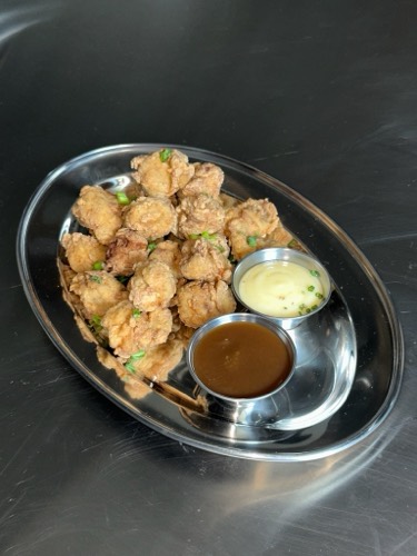 Fried chicken meatballs in soy garlic marinade served with French mayo and buffalo butter dipping sauces
